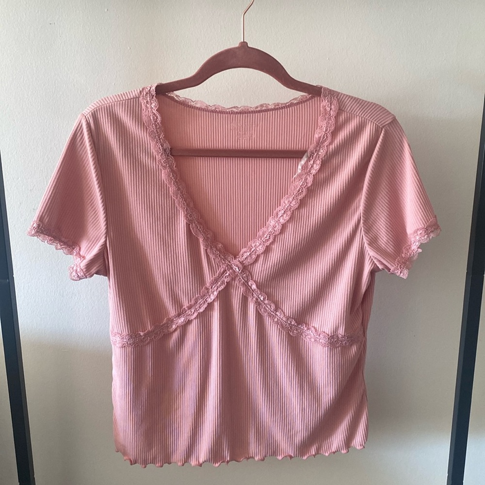 Light pink shirt. Thin cool material
